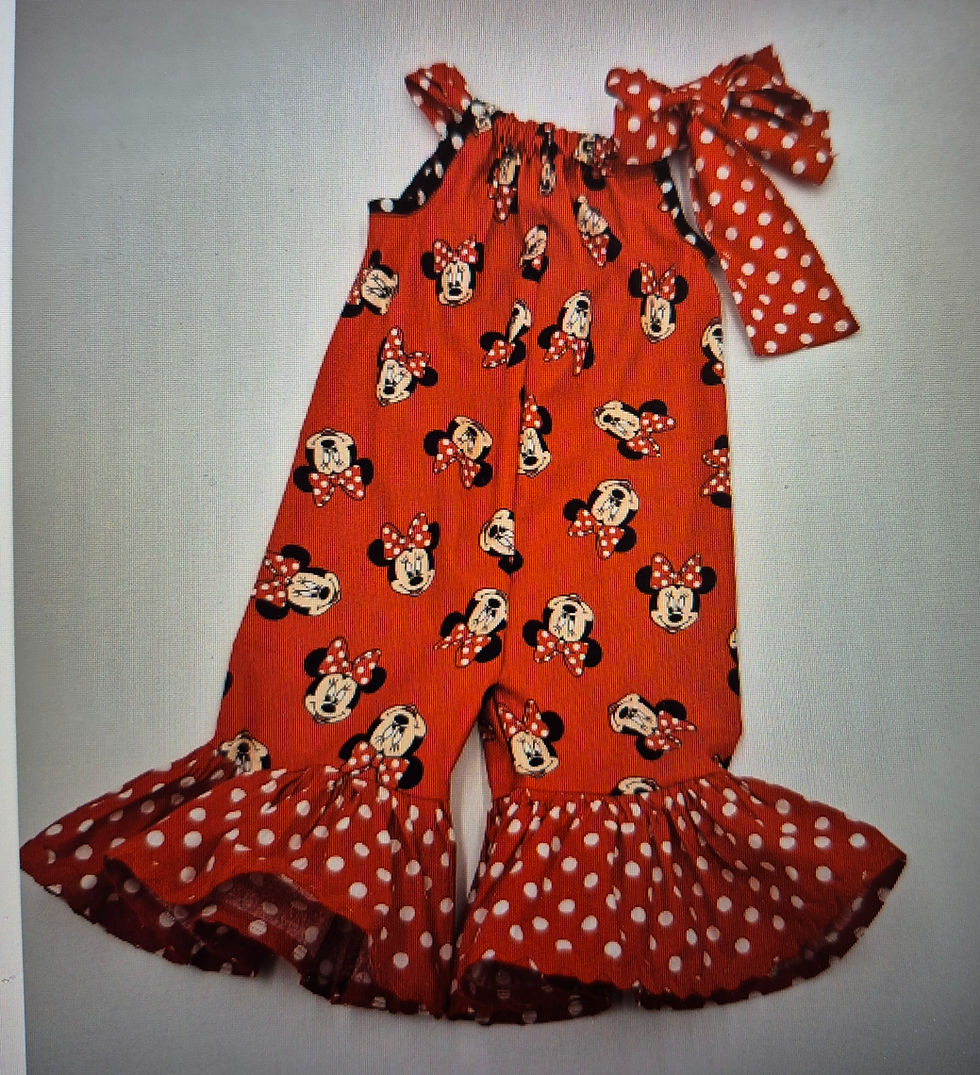 Thumbnail: Adorable girls romper with a bright red character print, tie shoulder detail, and polka dot