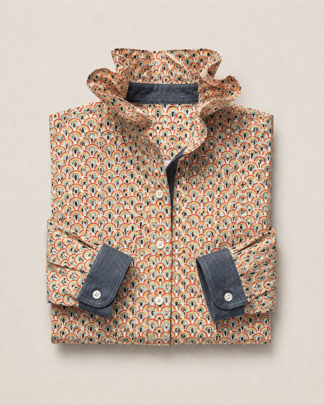 Reworked women’s button-up shirt with colorful rainbow print, standing ruffle collar, and denim cuff accents.