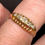 Thumbnail: antique 18ct gold diamond ring displayed on ladies finger
