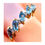 Thumbnail: Close up of Blue Topaz and Diamond Row Ring Displayed on Ladies Finger