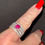 Thumbnail: Diamond and Ruby 18ct White Gold Pinkie Ring Vintage Displayed on Ladies Finger