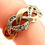 Thumbnail: 9ct Gold Diamond Twist Ring Displayed on Ladies Finger