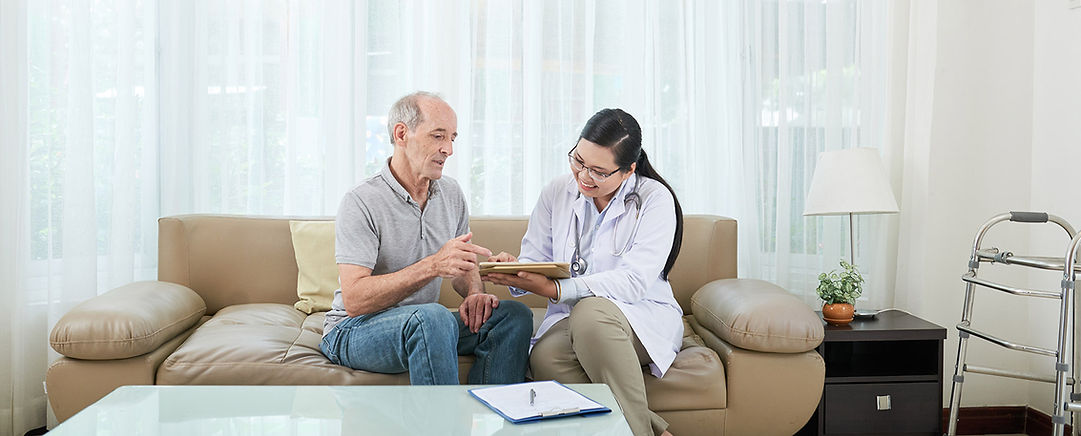 1cheerful-asian-female-doctor-visiting-senior-caucasian-male-patient-home.jpg