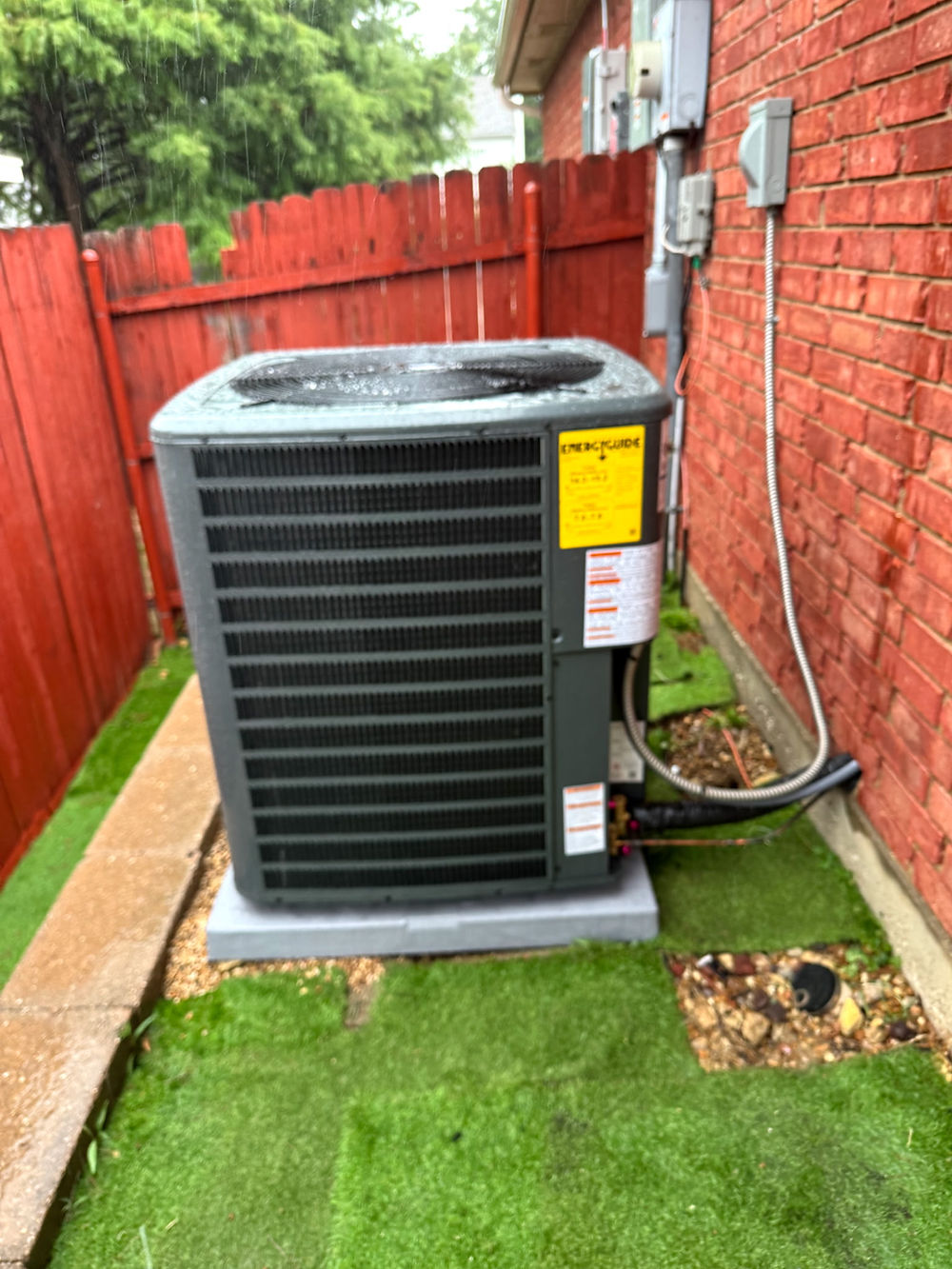 Outdoor HVAC air conditioning unit on a concrete pad