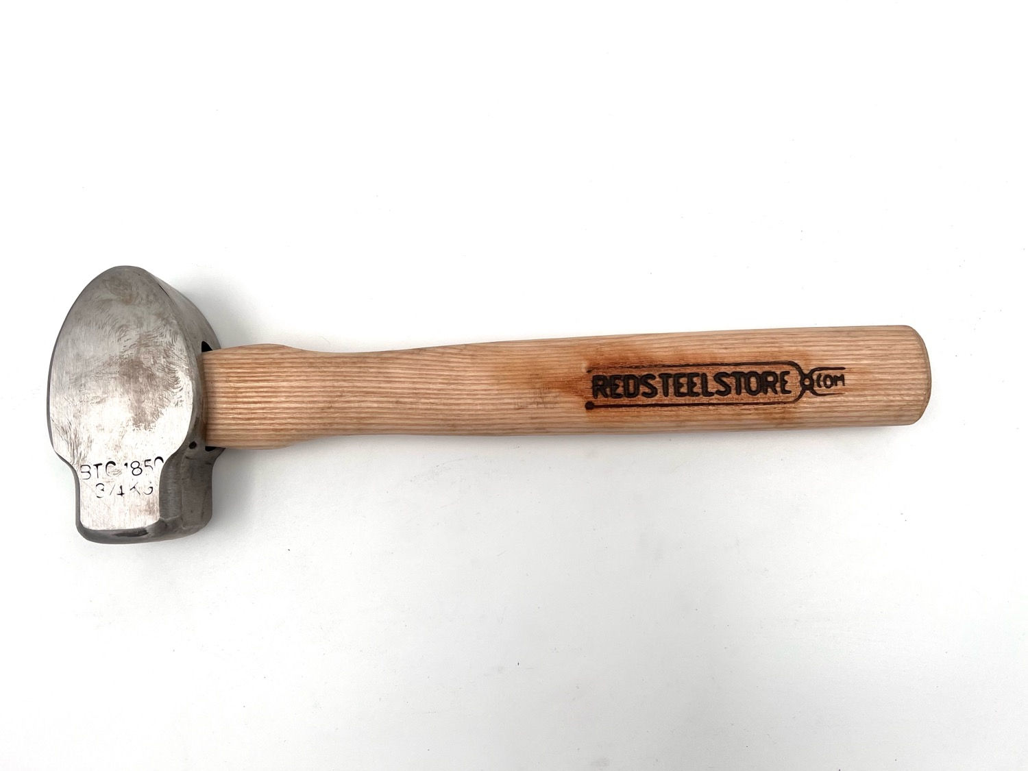 Skaft til balansert smihammer