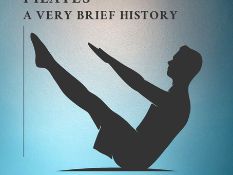 silhouette of a person doing the teaser pilates exercise