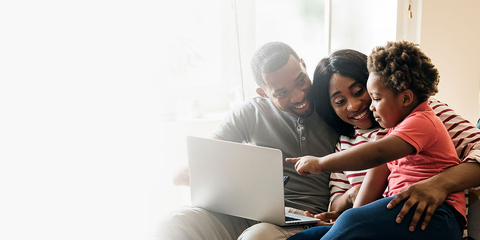 happy-black-family-toddler-pointing-laptop-screen-design-space.jpg
