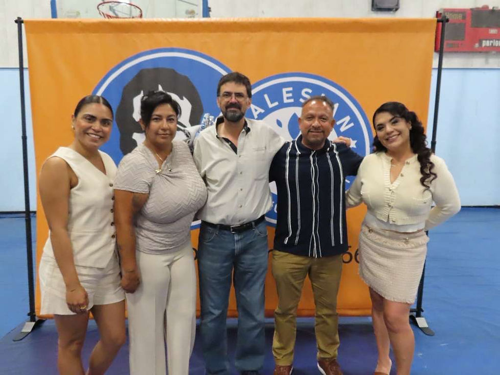 Executive Director JC Montenegro poses with an inspiring group of speakers at the event.