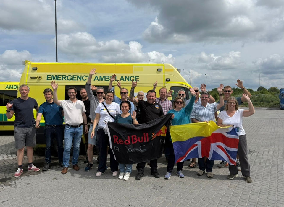 Just after crossing the border with our drivers and volunteers