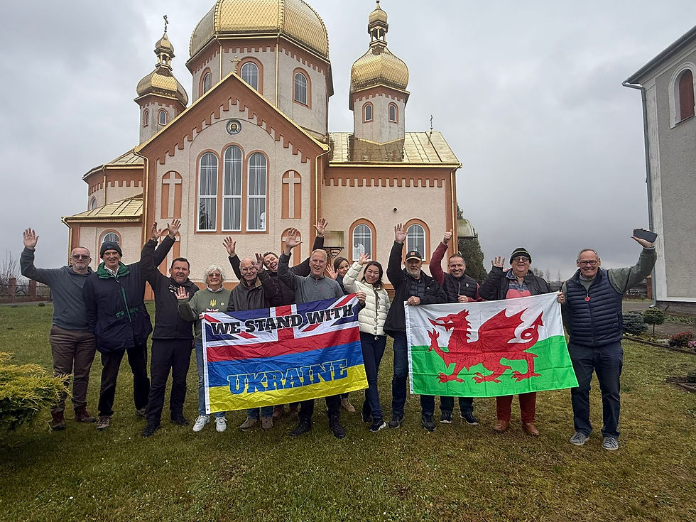Our drivers stop to take a photo just inside the border into Ukraine