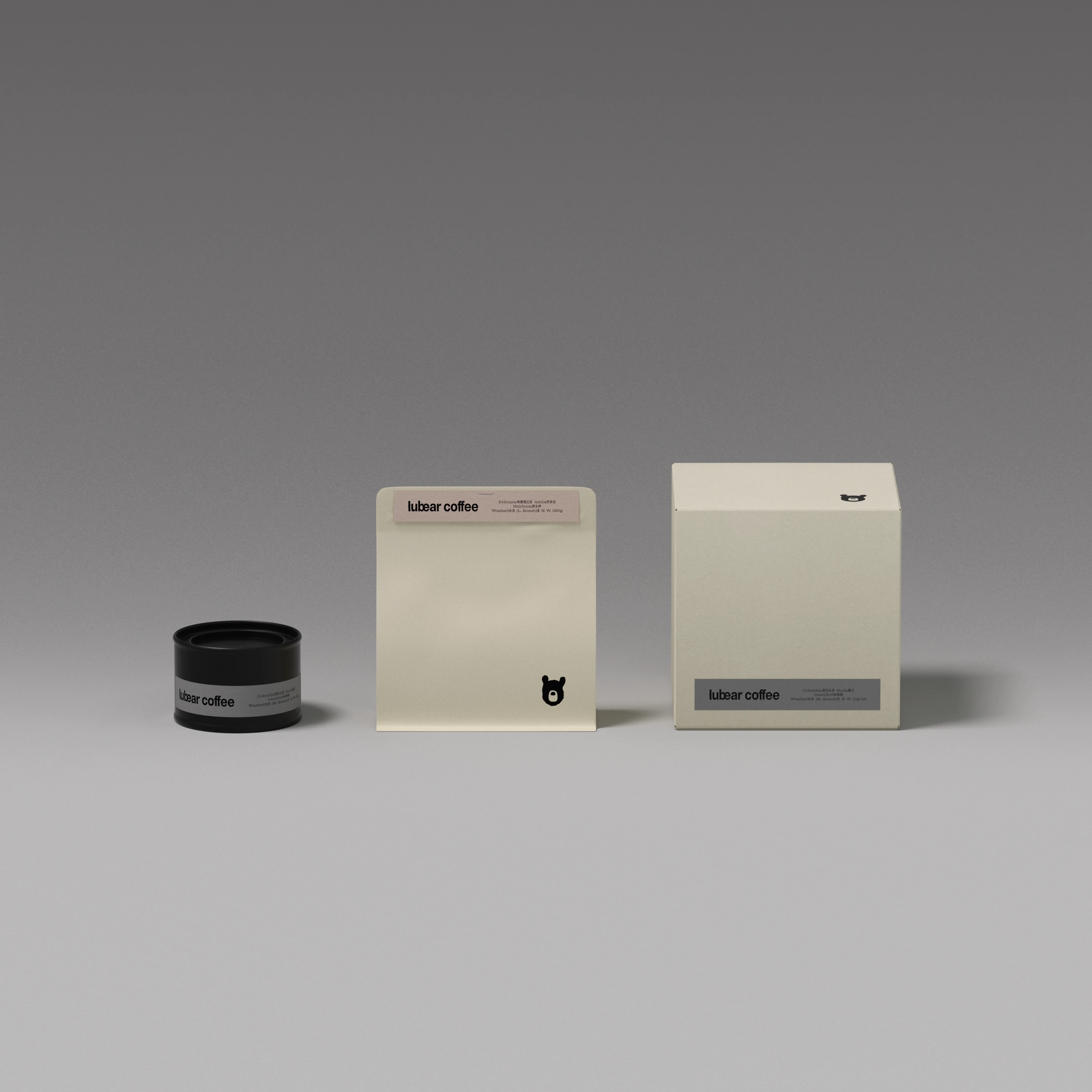 Lubear Coffee minimalist brand materials by taoSTUDIO, featuring coffee packaging, product boxes, printed labels, takeaway cup, neutral paper textures, and repeated moon bear logo details.