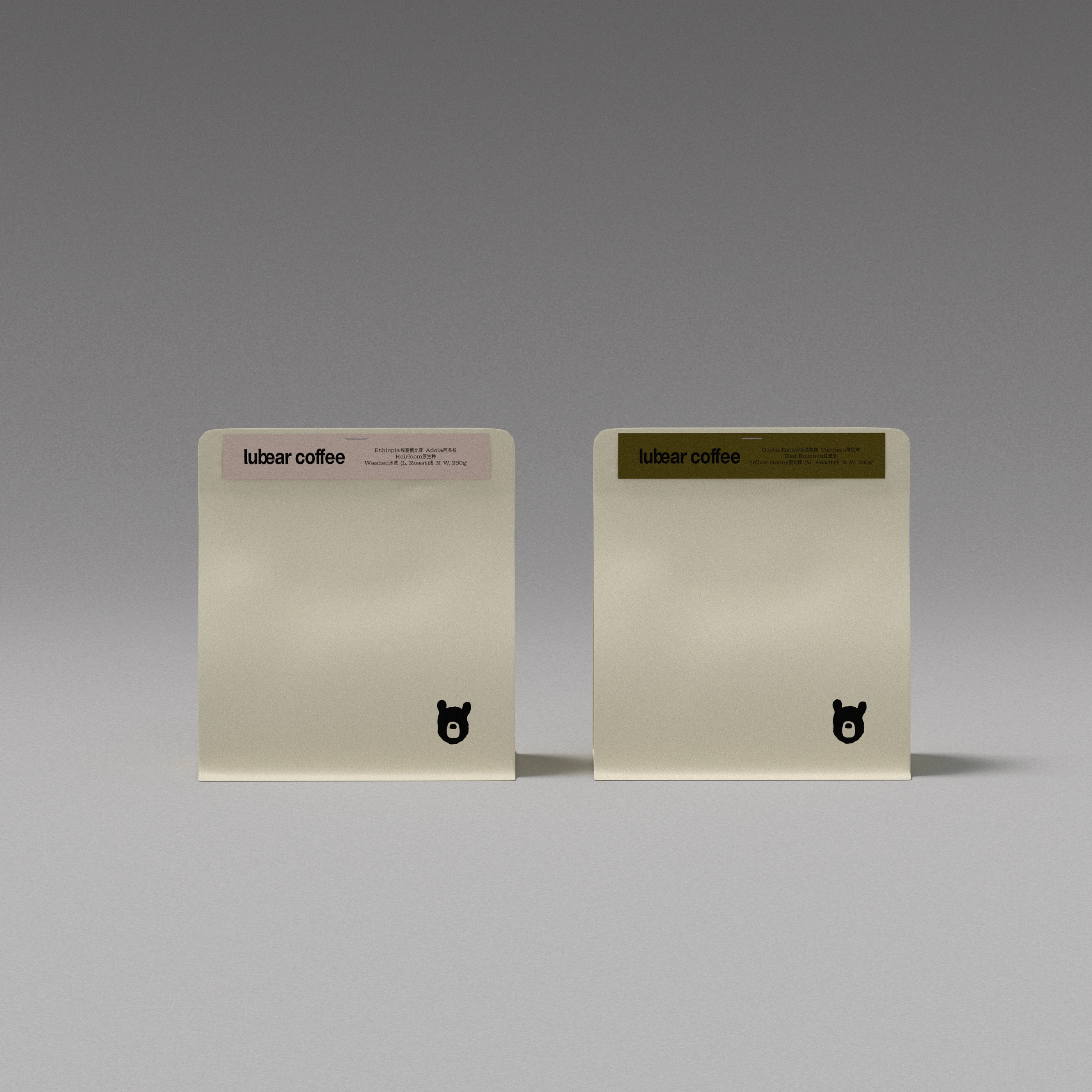 Lubear Coffee roast label system with printed wordmark, coffee information labels, neutral paper cards, and moon bear icon as part of the brand identity design.