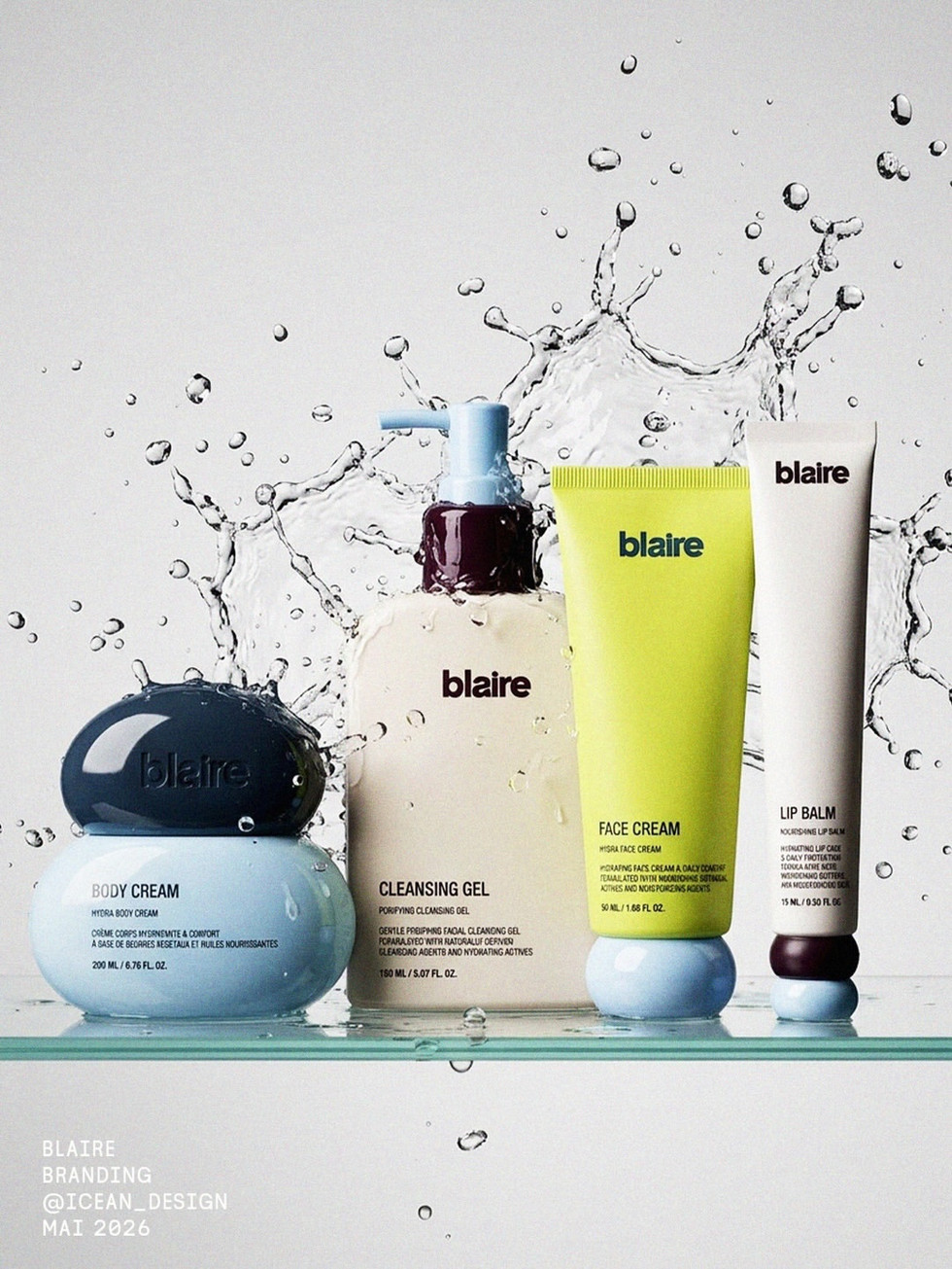 Blaire skincare product lineup photographed with a dramatic water splash backdrop, featuring body cream, cleansing gel, face cream, and lip balm in rounded packaging with powder blue, cream, citrus green, and deep burgundy accents.