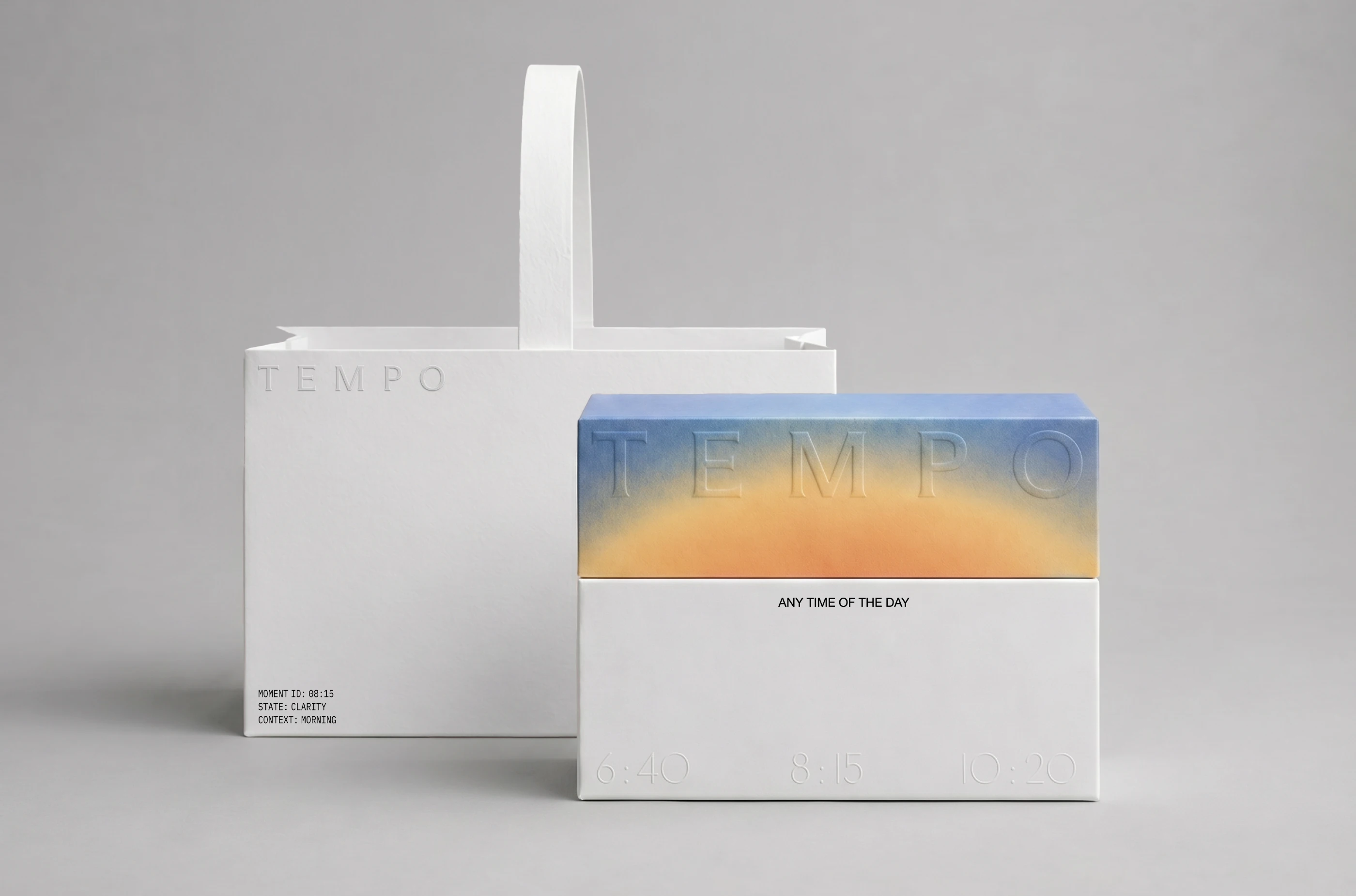 TEMPO chocolate brand identity by LYM Design Studio featuring a white branded shopping bag and a premium chocolate gift box with embossed typography, gradient color details, and time-based product labels.