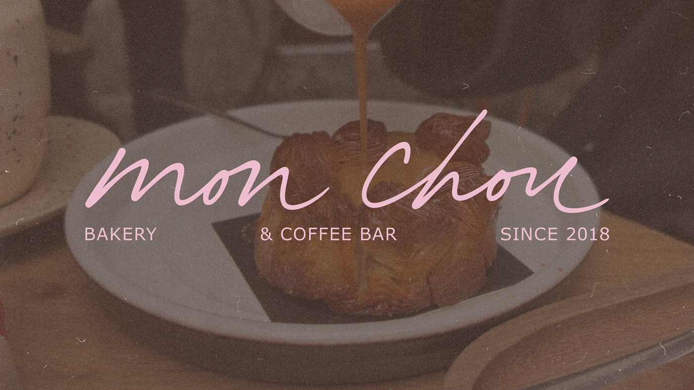 Mon Chou Bakery & Coffee Bar logo displayed over a warm, moody photo of caramel being poured onto a pastry, highlighting the brand’s cozy, handcrafted aesthetic.