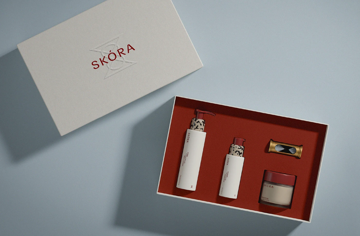 Skora bodycare gift set displayed in a presentation box with custom interior, featuring coordinated packaging, textured materials, and a cohesive brand identity designed for premium skincare experiences.