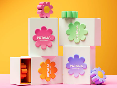 PETALIA fragrance packaging design by Naya Samoilova featuring white retail boxes with colorful flower-shaped labels and caps against a bright yellow and pink background.
