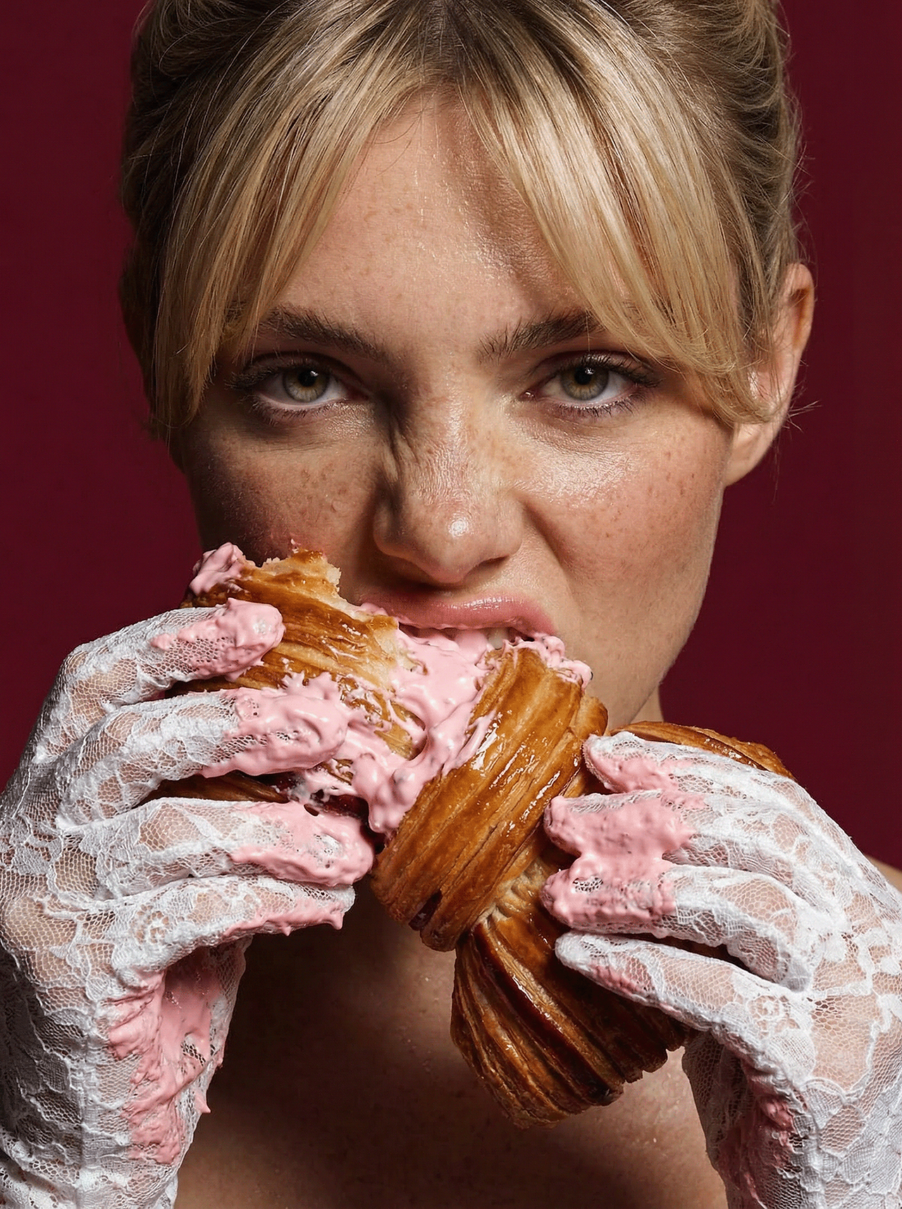 Lifestyle campaign image of La Maison Du Lapin bakery branding featuring model with lace gloves eating pastry, highlighting playful indulgence and brand personality.