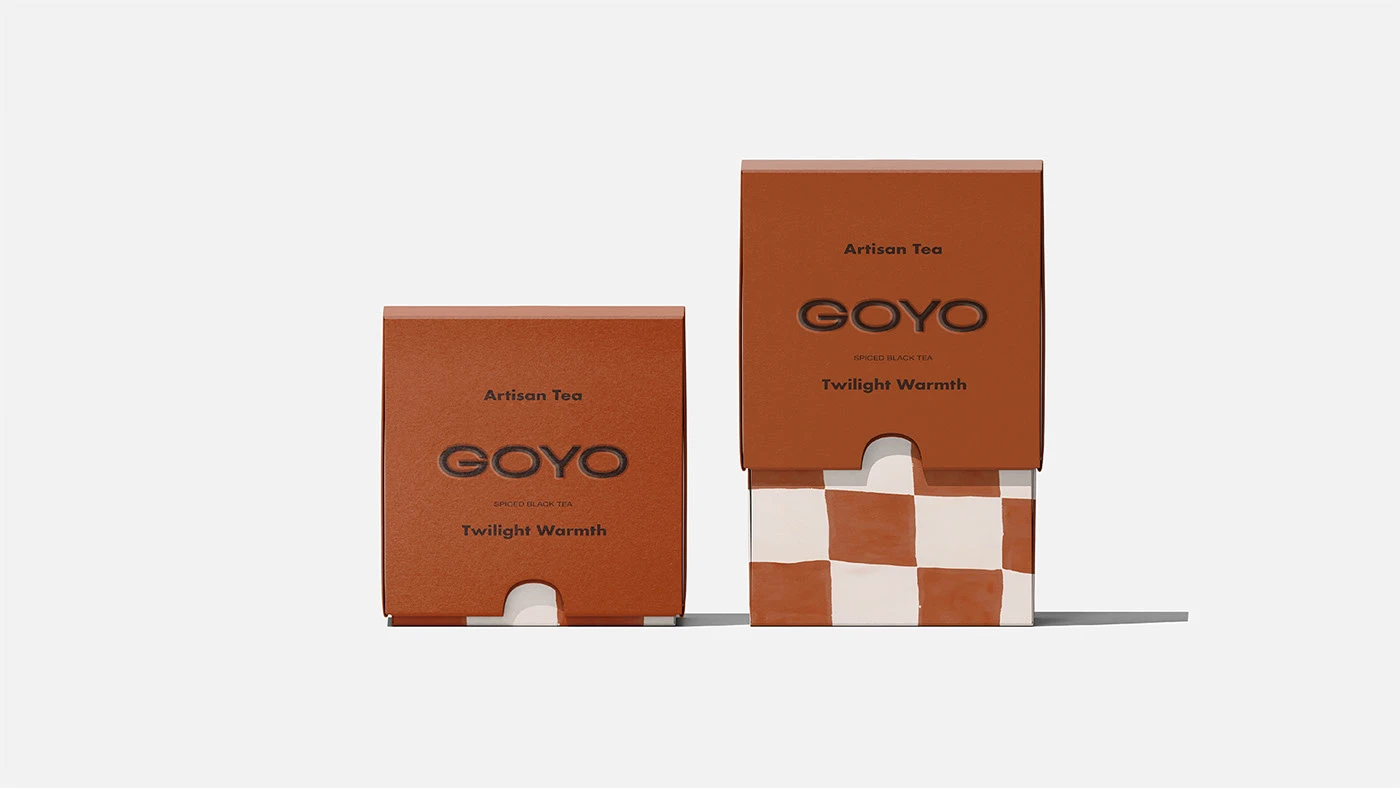 Goyo Tea packaging design in warm terracotta color for Twilight Warmth spiced black tea, featuring minimalist typography and bold checkered pattern detail