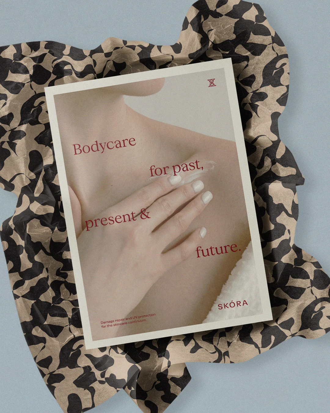 Skora brand editorial artwork featuring tactile photography and the message “Bodycare for past, present & future,” layered over sensuous skin imagery and patterned material, expressing the brand’s time-based skincare philosophy.