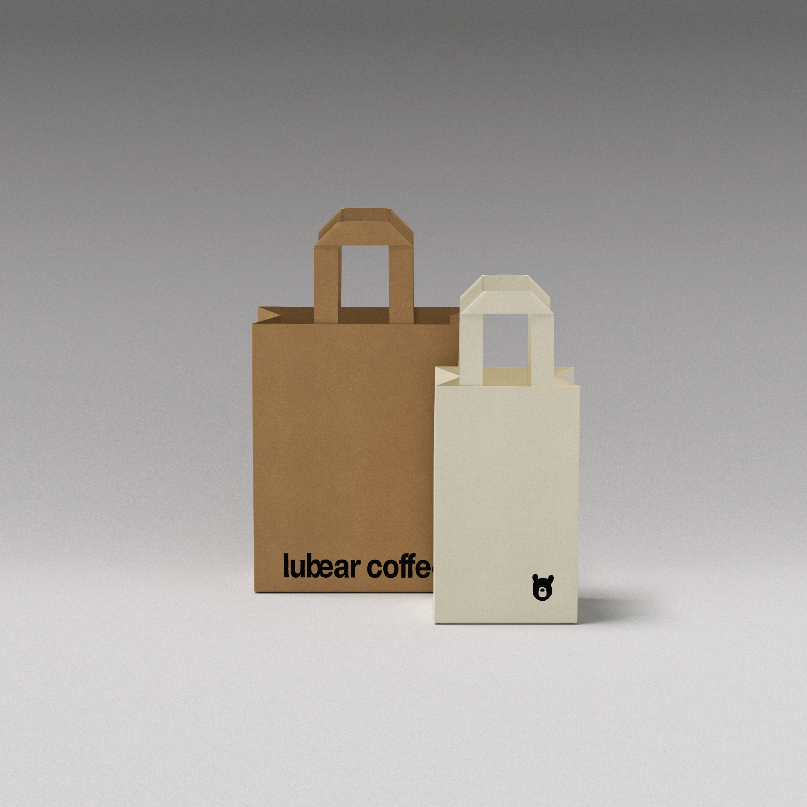 Two Lubear Coffee cream paper bags with colored label strips and small moon bear logo, showcasing the minimalist coffee packaging system by taoSTUDIO.