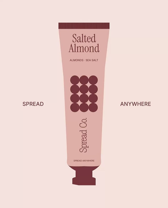 Salted Almond nut butter tube packaging for Spread Co., featuring minimalist typography, soft pink tones, and circular graphic elements.