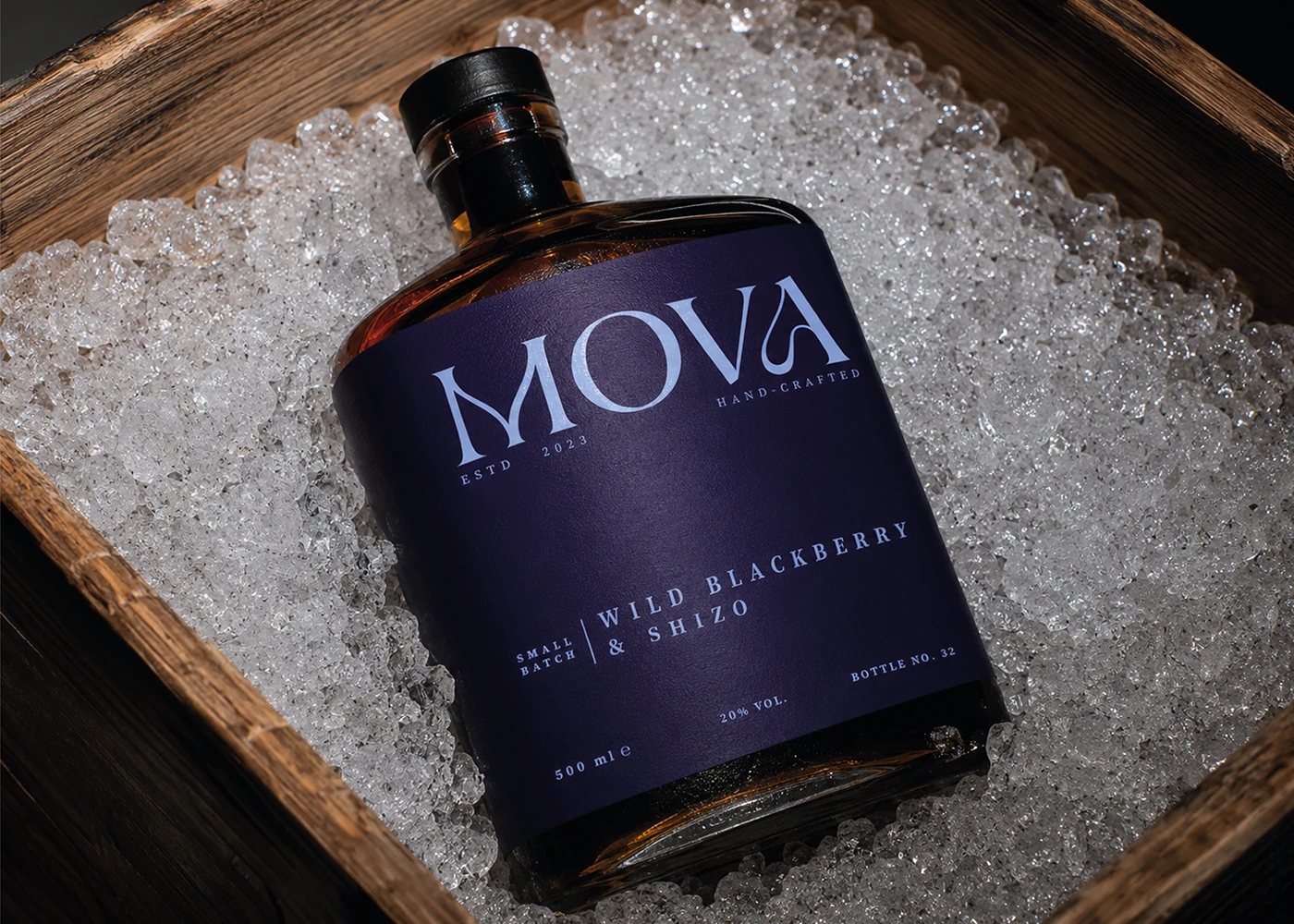 MOVA wild blackberry and shiso liqueur bottle with minimalist purple packaging displayed on crushed ice.