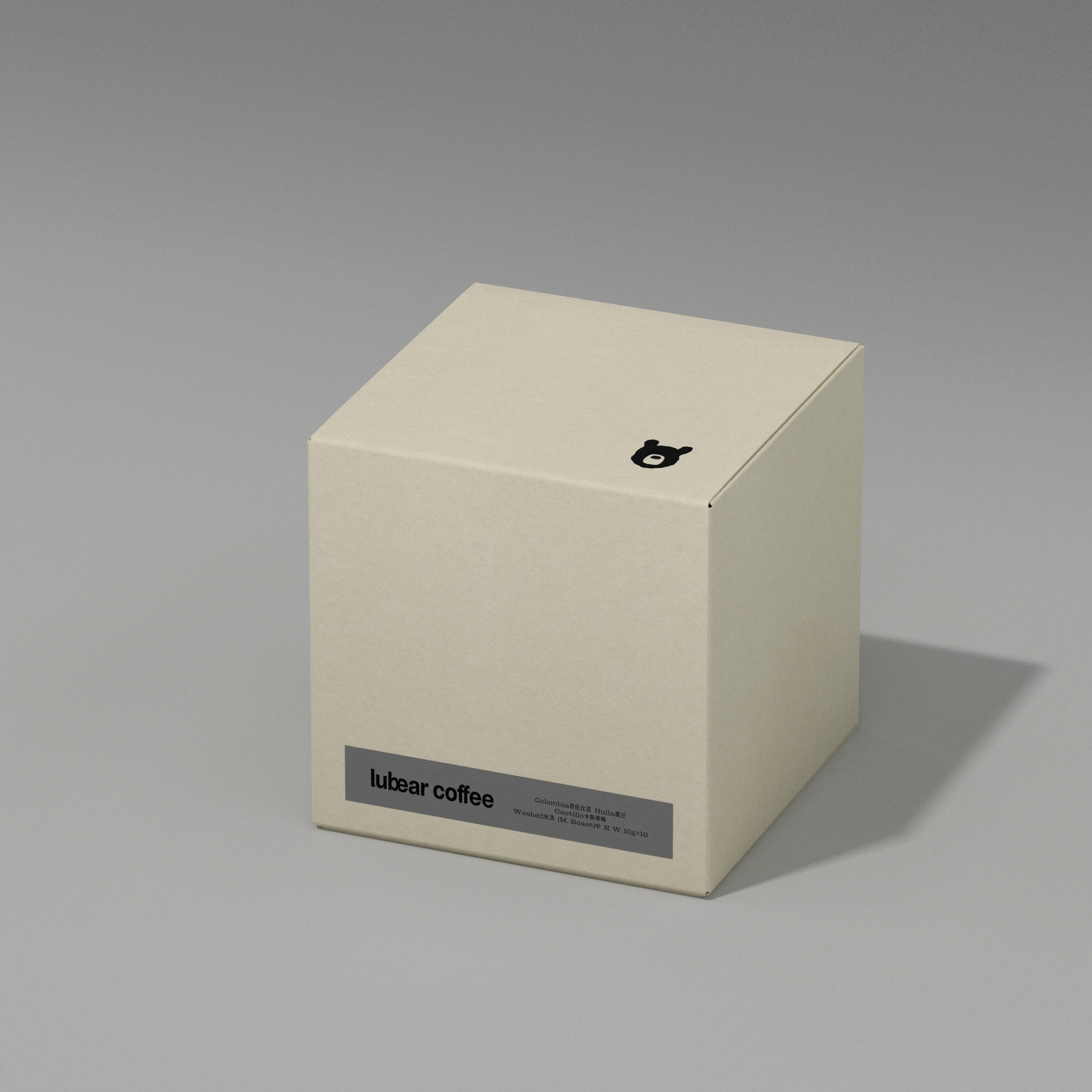 Cream Lubear Coffee product box with gray printed label and small moon bear logo, showcasing the brand’s warm minimalist packaging design by taoSTUDIO.