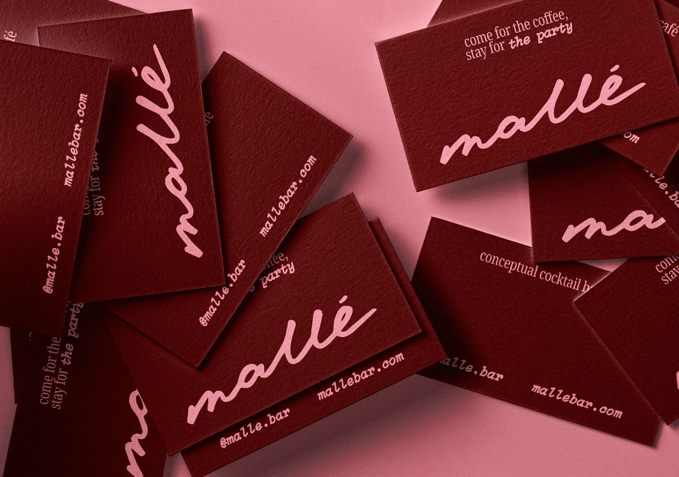 Business card design for Mallé cocktail bar and café showcasing layered layouts, bold typography, and a rich nighttime-inspired color scheme.
