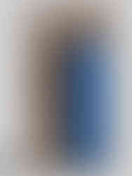 Front view of a Velora packaging box in textured brown material featuring a bold white “03” and an embossed blue vertical logo panel.