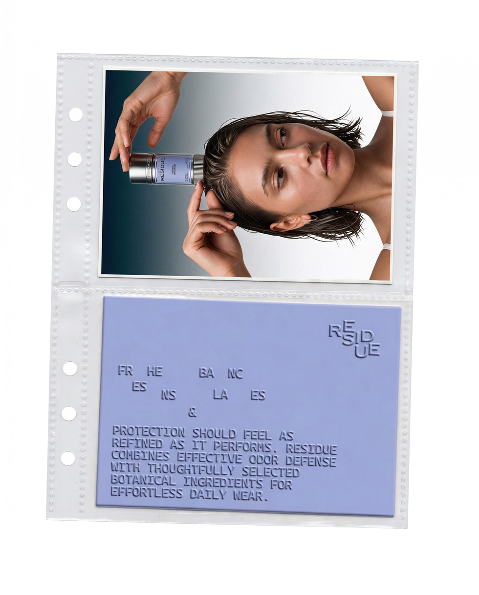 Clear presentation sleeve displaying a lifestyle product photograph above an embossed powder blue brand card with raised typography and brand messaging.