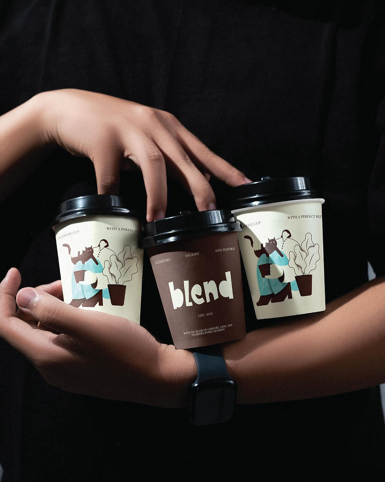 Three takeaway coffee cups for Blend Coffee & Bakehouse held in hand, featuring playful illustrations and warm minimal branding in brown and cream tones.