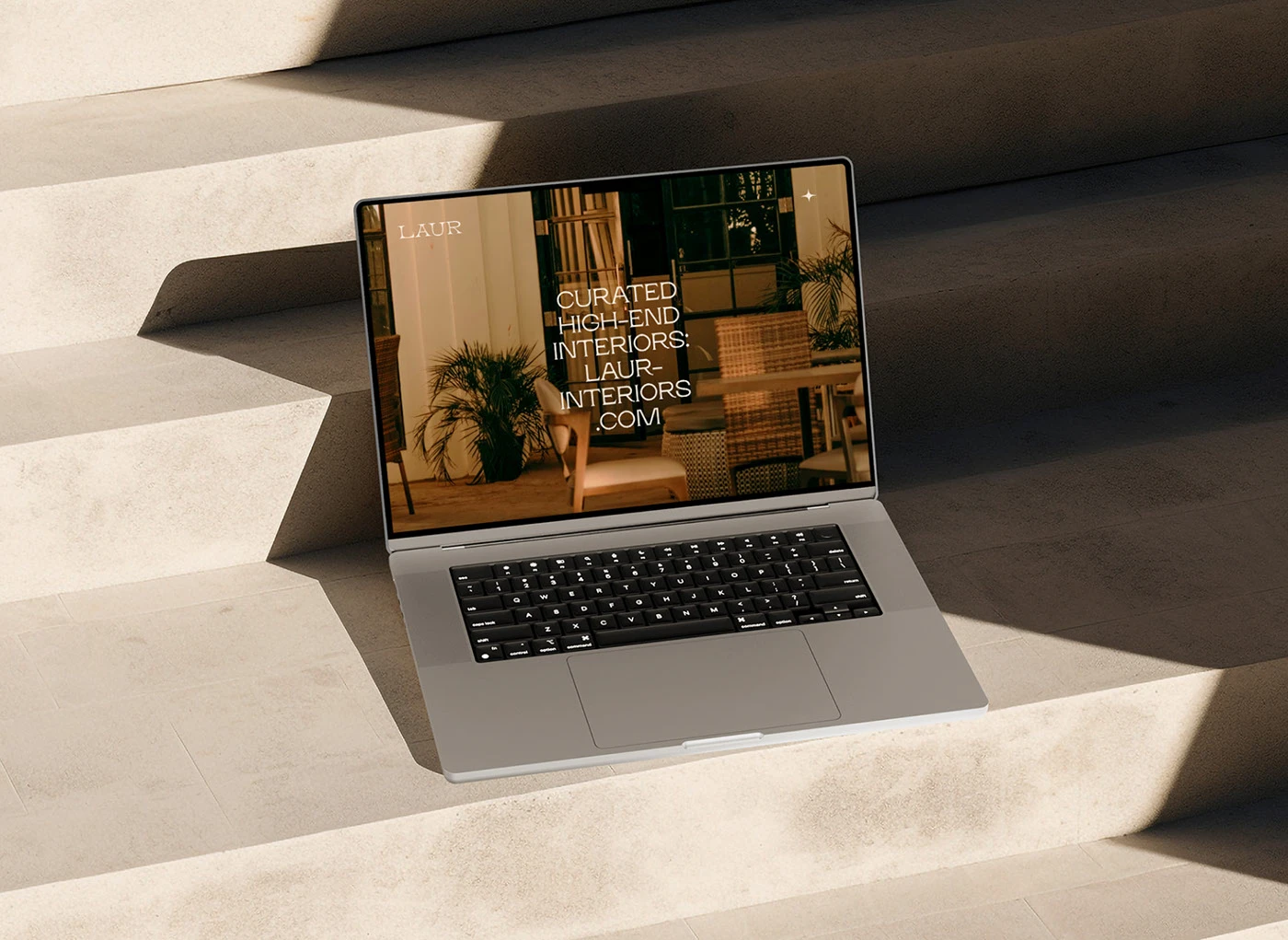 Website design for Laur Interior Design Studio by Yana Vision displayed on a laptop, showcasing modern web branding, editorial typography, and digital identity for a luxury minimalist interiors brand.