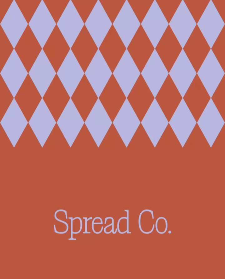 Geometric diamond pattern from the Spread Co. brand identity system, used as a graphic element across packaging and brand materials.