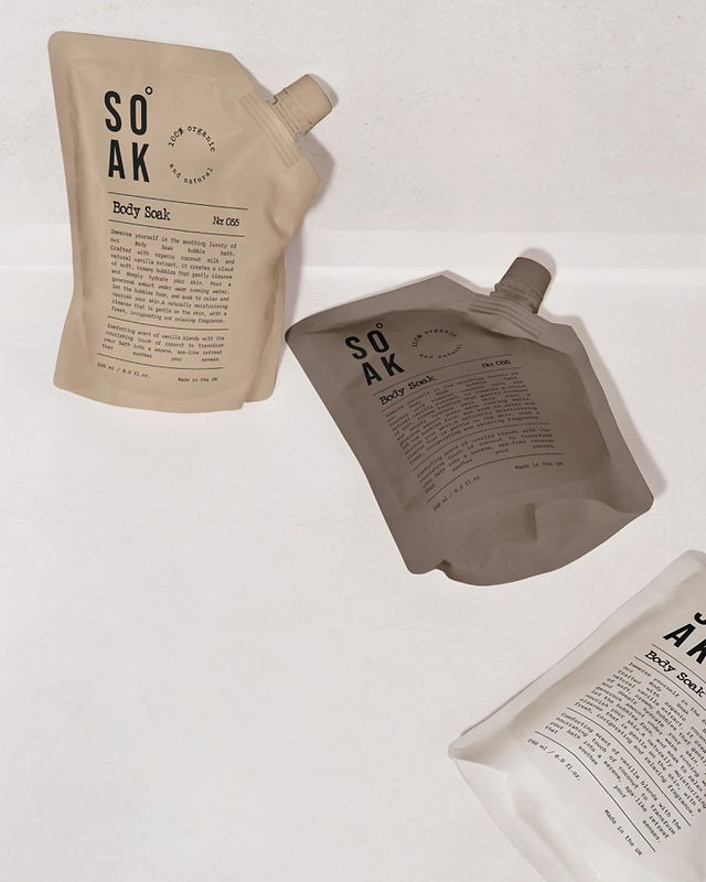 Neutral Soak Body Soak refill pouches with black typography shown on a clean white surface with soft shadows.