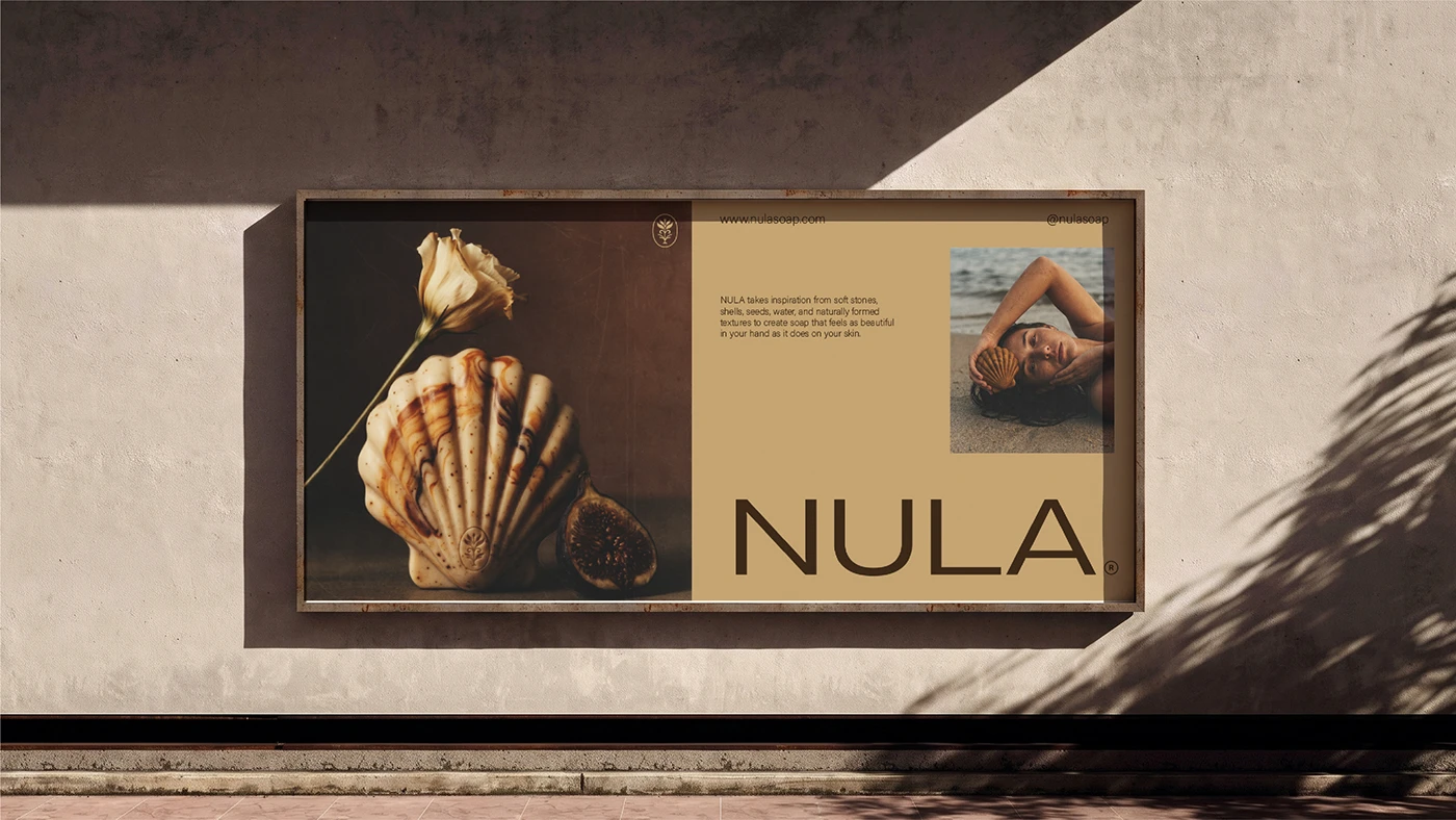 NULA outdoor billboard design featuring sculptural soap photography, minimalist typography, natural imagery, and warm neutral branding.