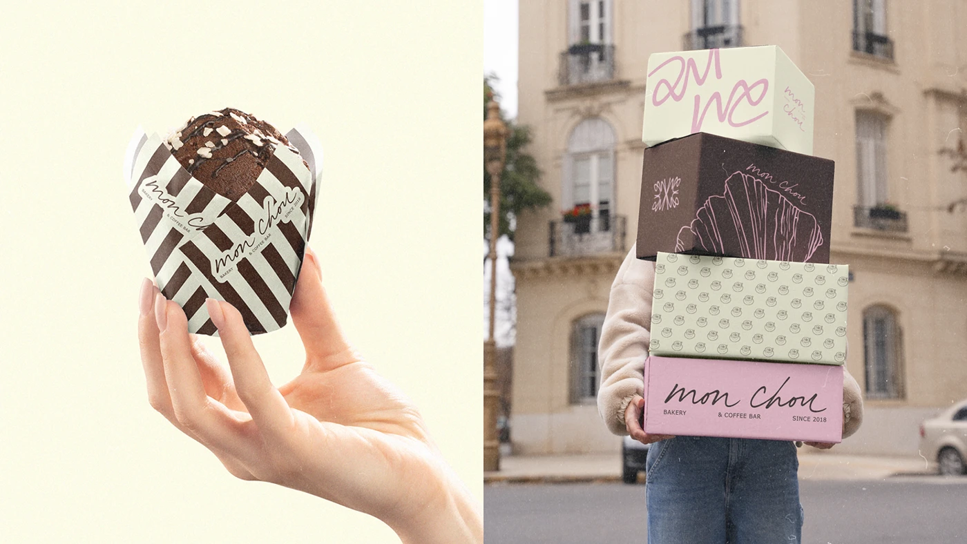Mon Chou branded muffin wrapped in brown-and-cream striped packaging alongside a person carrying a tall stack of pastel bakery boxes featuring illustrated patterns and handwritten logos.