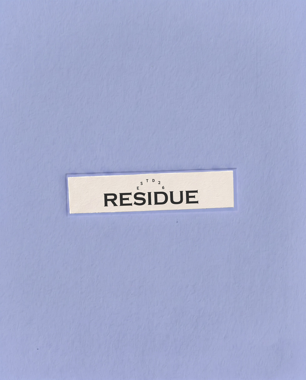 Residue wordmark printed on a white paper label centered against a textured powder blue background.