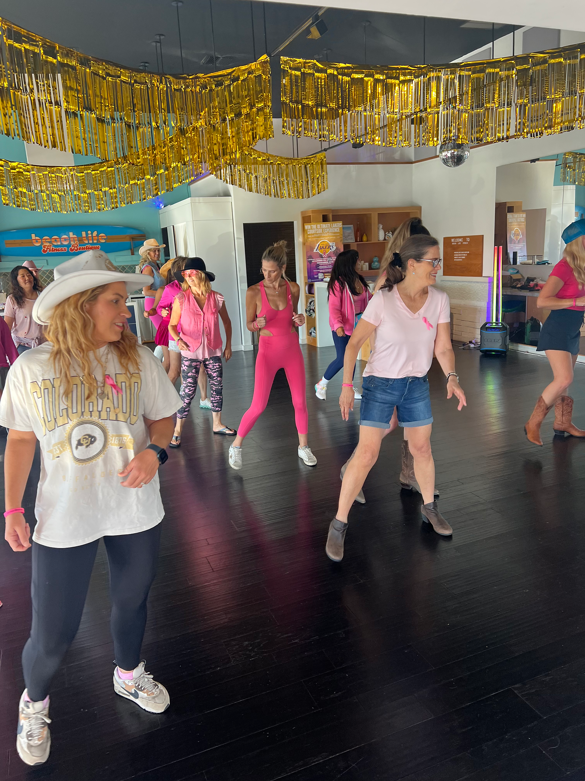 Women line dancing at Butterfly Strong Fundraiser event