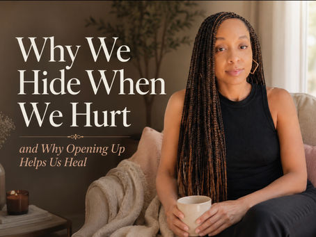 Black woman with long braids sitting indoors holding a mug in a calm, softly lit space, with the title “Why We Hide When We Hurt and Why Opening Up Helps Us Heal” overlaid on the image.