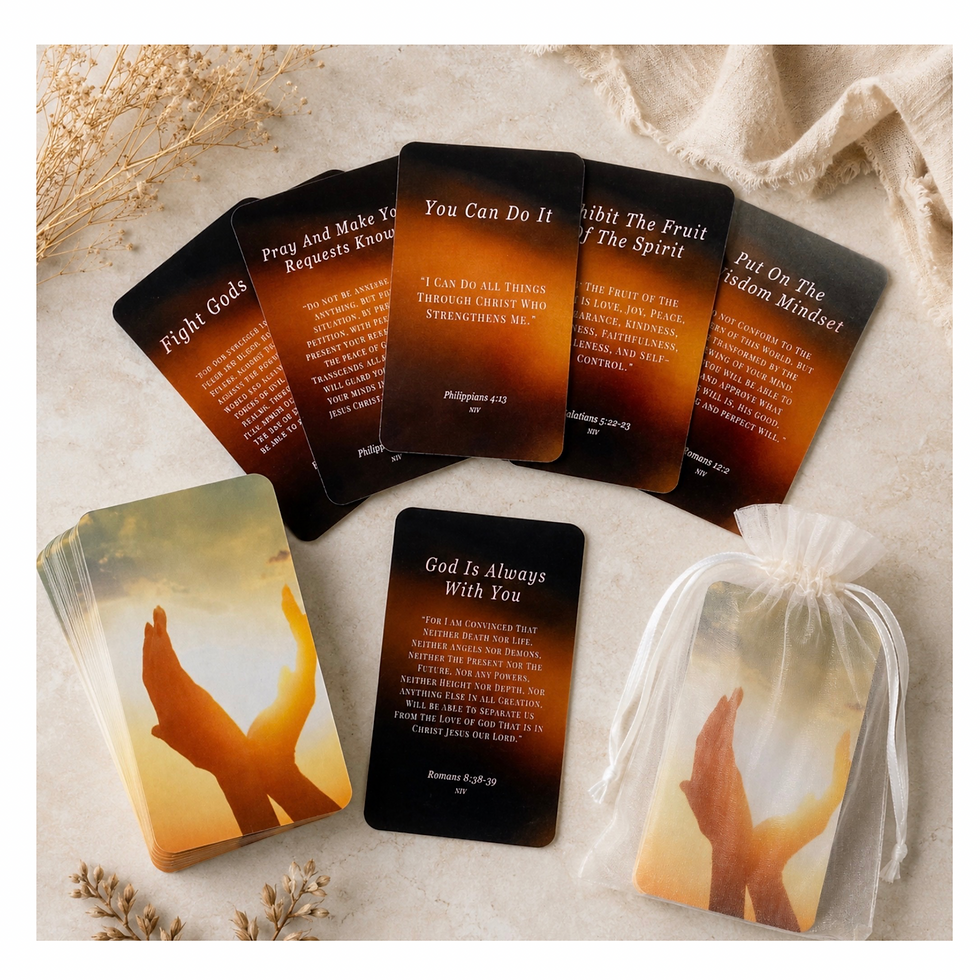 Bible verse affirmation cards fanned on beige fabric, with dried flowers and a sheer pouch, in warm orange-and-black tones.