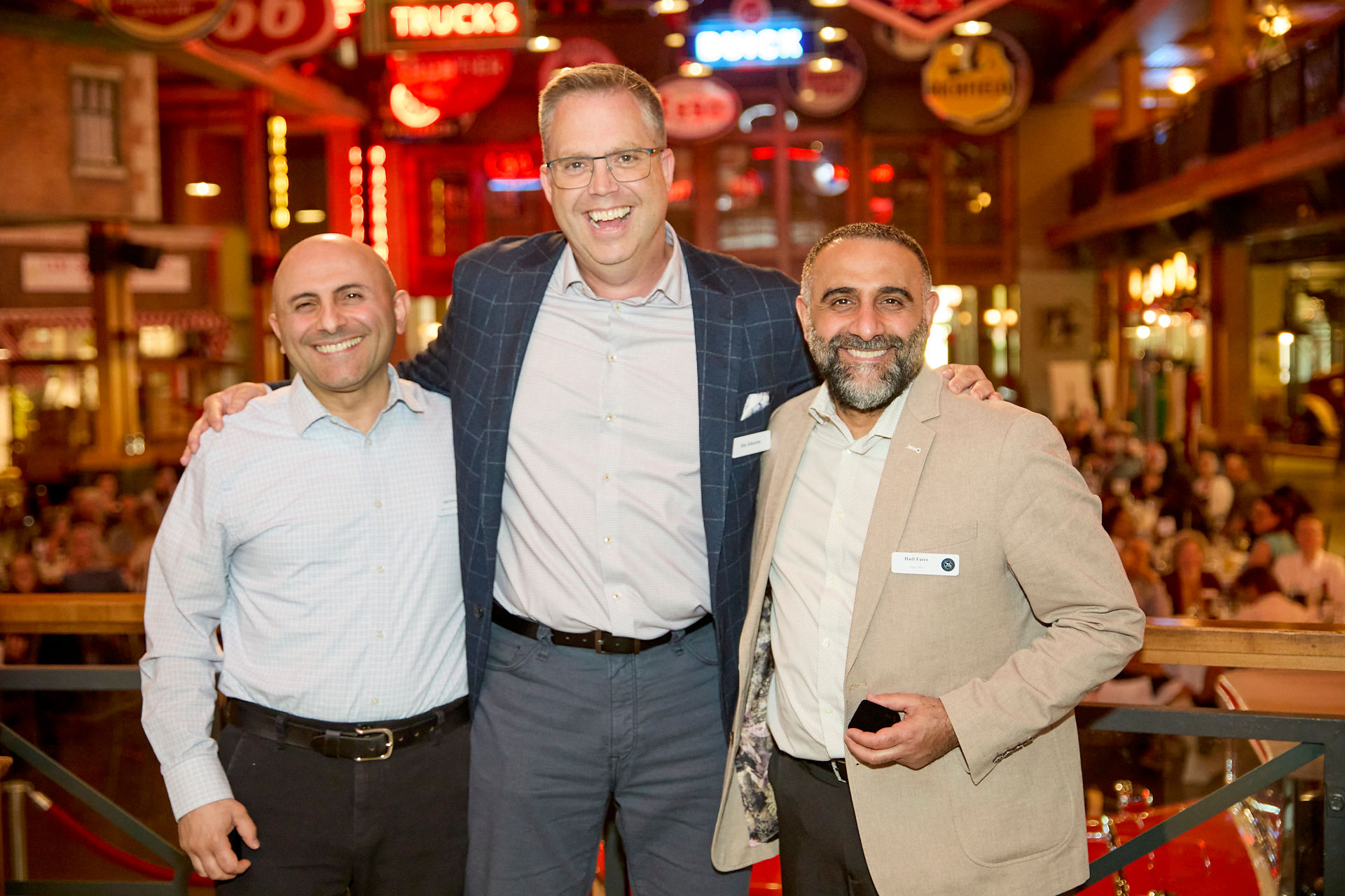 An award recipient with his brother an a Safeway executive in Gasoline Alley at Heritage Park Calgary. By Jeff B Photography