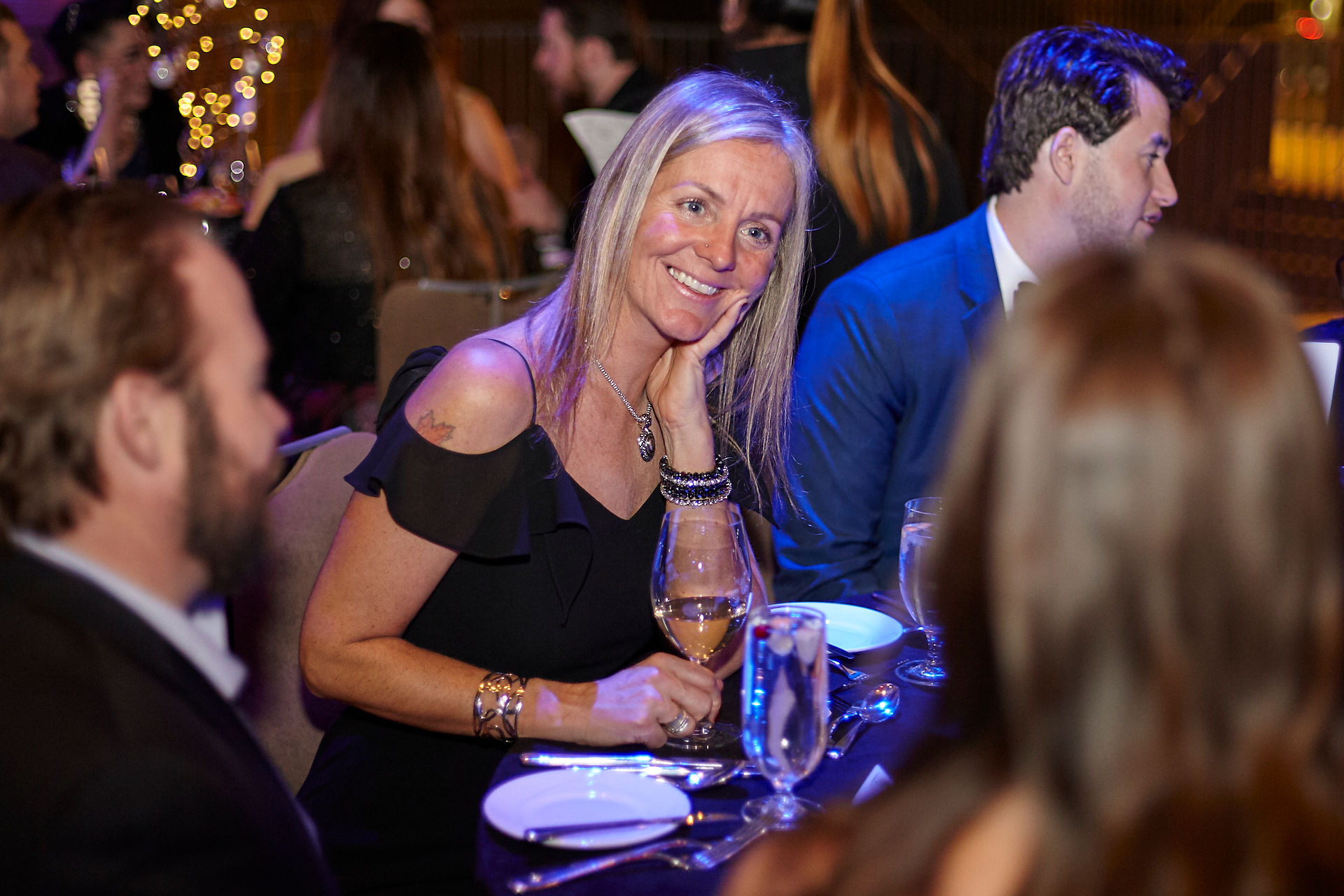 Mock-gambling at casino-themed corporate holiday party.