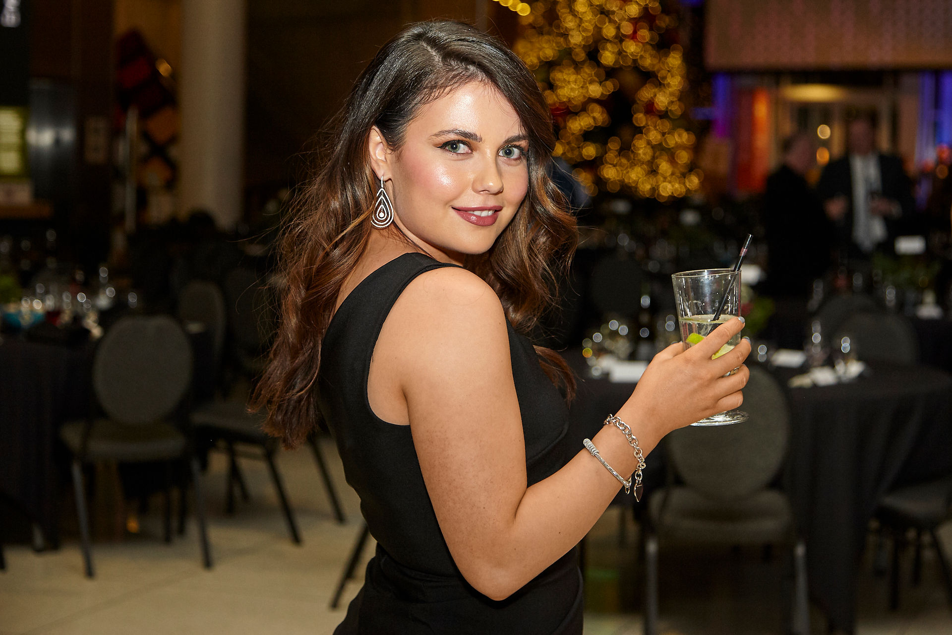 Mock-gambling at casino-themed corporate holiday party.