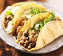 bigstock-Tacos--in-mexican-yellow-corn-54184112.jpeg