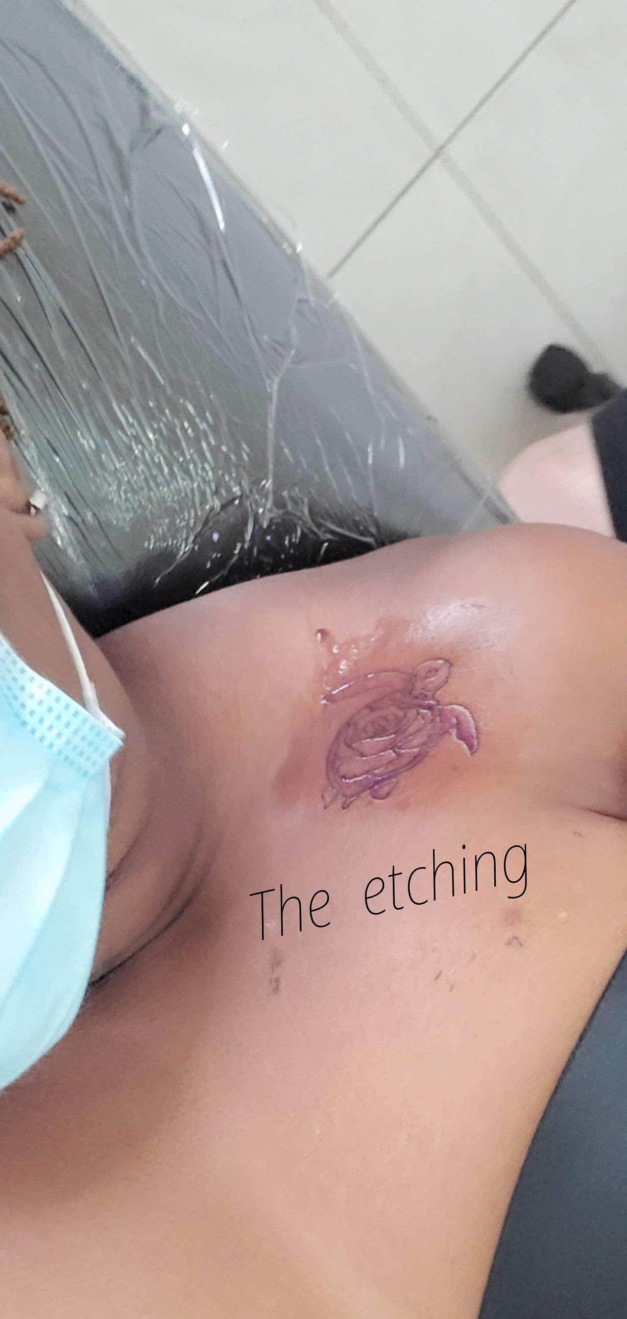 Tattoo etching on skin 