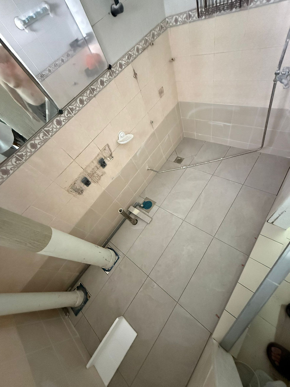 Tiles popping, singapore bathroom floor, bathroom floor fix, toilet floor fix, tile pop fix, how to fix popped tiles, 10 studio sg, 10 studio, 10 studio articles, how to fix toilet floor, toilet floor fix, contractor for toilet floor, replace tiles, sg floor tiles, tile replacement, tile replace singapore