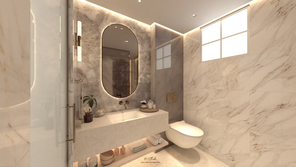 Modern bathroom with marble walls and a floating sink. Illuminated oval mirror, potted plant, and toiletries create a clean, elegant ambiance.