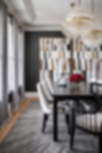 Dining room with mixed textures and finishes.