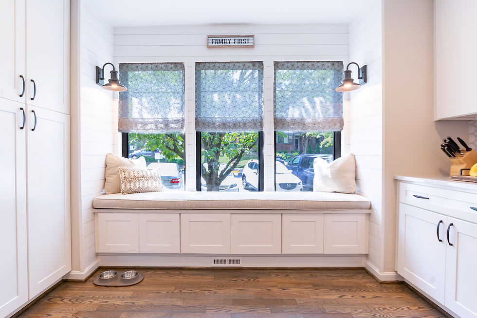 Cozy window seat and sconces for kitchen.